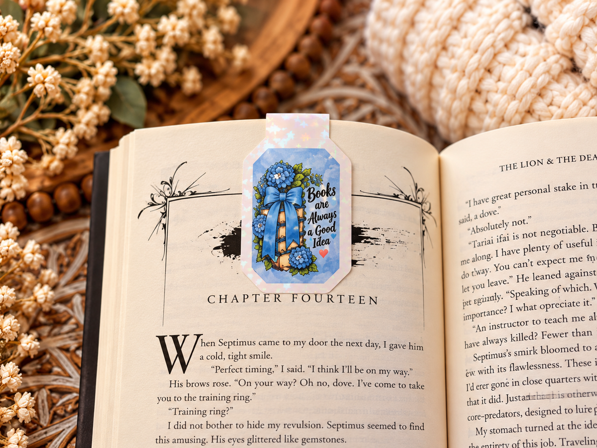 Books Are Always a Good Idea magnetic bookmark front clipped over a book page