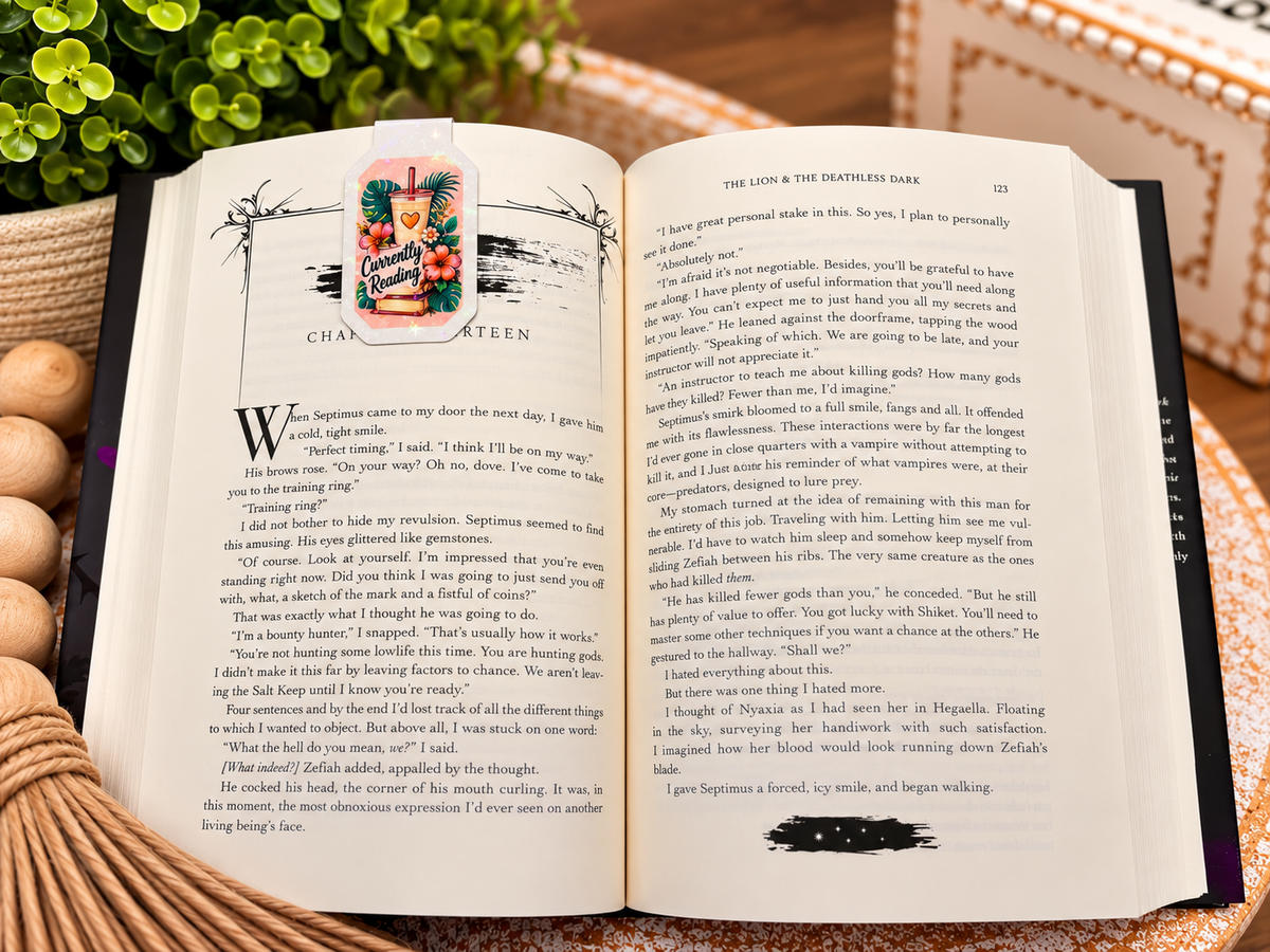 Currently Reading magnetic bookmark clipped to an open book