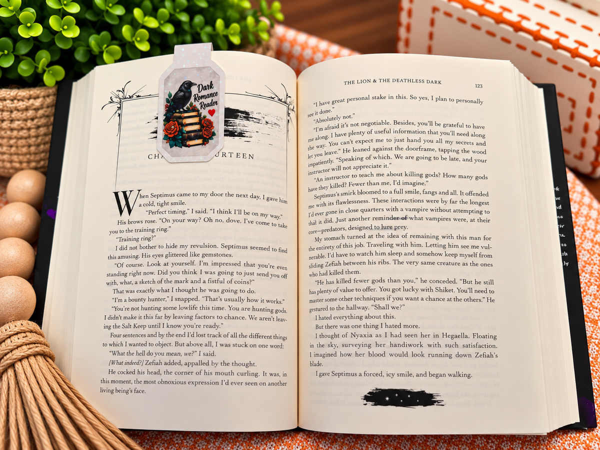 Dark Romance Reader magnetic bookmark front shown on an open book