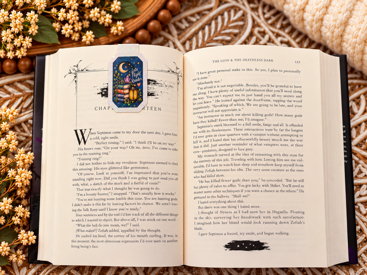 Late Night Reader magnetic bookmark reverse side clipped over an open book